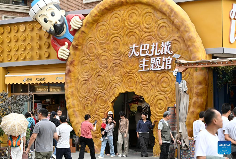 Técnicas tradicionais de fabricação de naan herdadas e desenvolvidas em Xinjiang